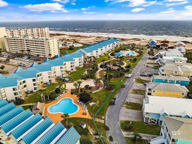 aerial view featuring a water view and a beach view