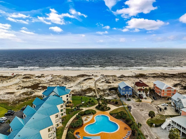 aerial view with a view of the beach and a water view