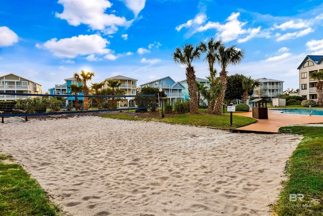 surrounding community featuring volleyball court