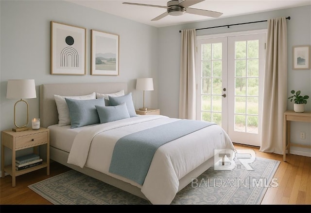 159 W Conway Dr, Mobile, AL 36608 - bedroom featuring access to outside, french doors, wood finished floors, and a ceiling fan
