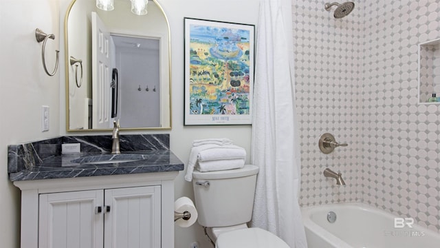 full bathroom featuring vanity, toilet, and shower / tub combo with curtain