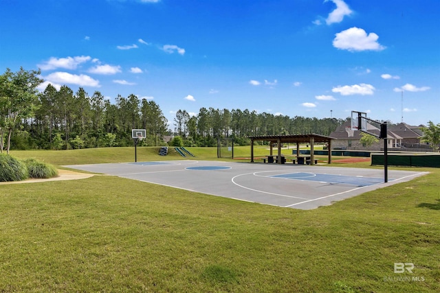 view of sport court featuring a lawn, a playground, and a pergola