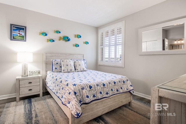 25360 Perdido Beach Blvd Unit 401, Orange Beach, AL 36561 - bedroom with wood finished floors and baseboards