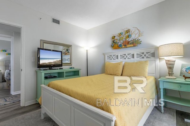 25360 Perdido Beach Blvd Unit 401, Orange Beach, AL 36561 - bedroom with wood finished floors and baseboards