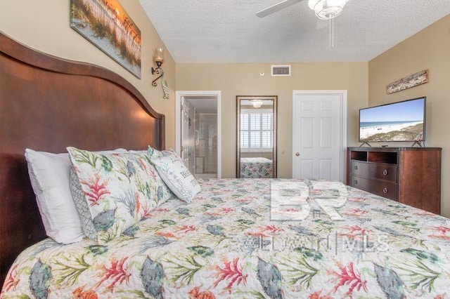 25360 Perdido Beach Blvd Unit 401, Orange Beach, AL 36561 - bedroom with a textured ceiling and a ceiling fan