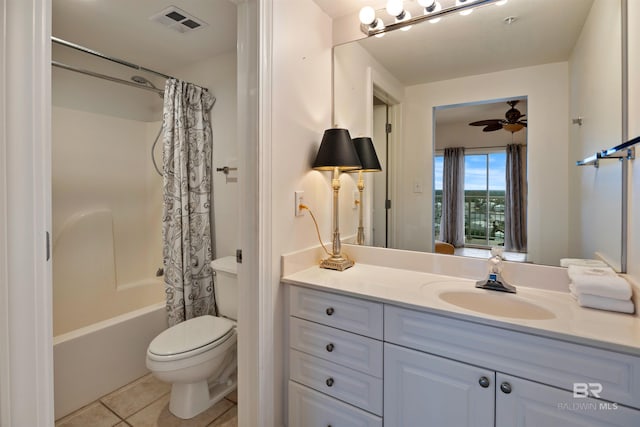 full bath featuring tile patterned flooring, vanity, toilet, a ceiling fan, and shower / bath combo