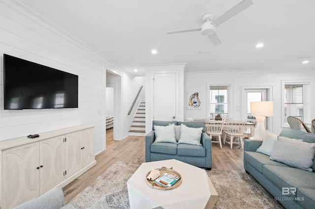 1476 Sandpiper Ln Unit B, Gulf Shores, AL 36542 - living area featuring crown molding, stairway, light wood finished floors, ceiling fan, and recessed lighting