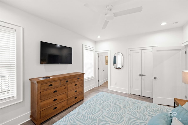1476 Sandpiper Ln Unit B, Gulf Shores, AL 36542 - bedroom with wood finished floors, baseboards, recessed lighting, and a ceiling fan