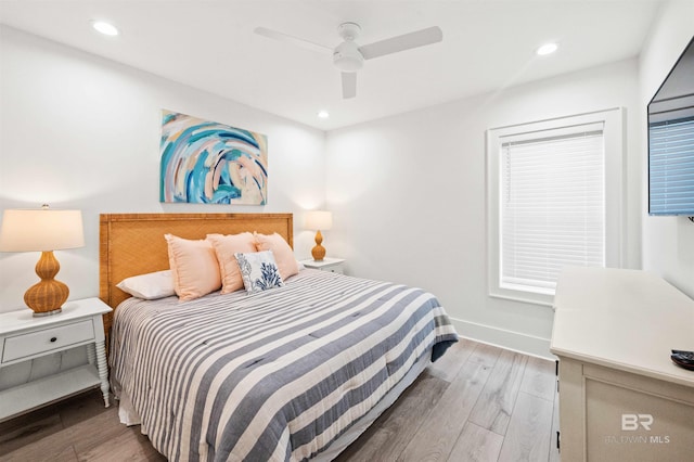 1476 Sandpiper Ln Unit B, Gulf Shores, AL 36542 - bedroom featuring wood finished floors, recessed lighting, ceiling fan, and baseboards