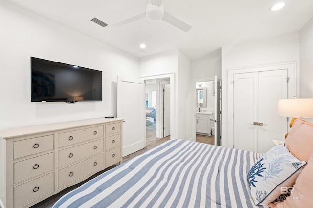 1476 Sandpiper Ln Unit B, Gulf Shores, AL 36542 - bedroom with light wood-style floors, recessed lighting, a closet, ensuite bathroom, and a ceiling fan
