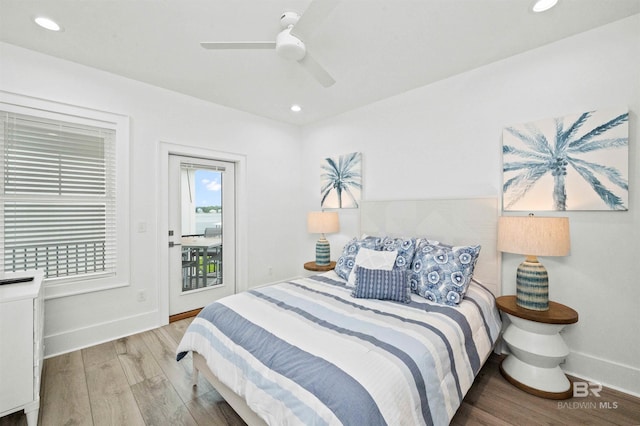1476 Sandpiper Ln Unit B, Gulf Shores, AL 36542 - bedroom featuring baseboards, wood finished floors, access to outside, recessed lighting, and a ceiling fan