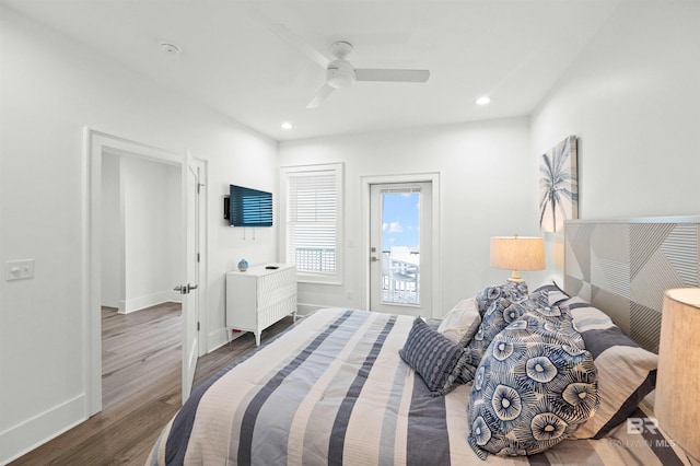 1476 Sandpiper Ln Unit B, Gulf Shores, AL 36542 - bedroom with wood finished floors, access to outside, recessed lighting, ceiling fan, and baseboards