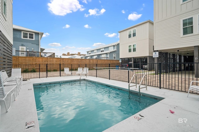 1476 Sandpiper Ln Unit B, Gulf Shores, AL 36542 - community pool with a patio area and a residential view