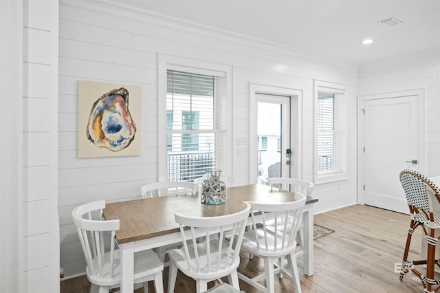 1476 Sandpiper Ln Unit B, Gulf Shores, AL 36542 - dining space with ornamental molding, light wood-type flooring, and recessed lighting