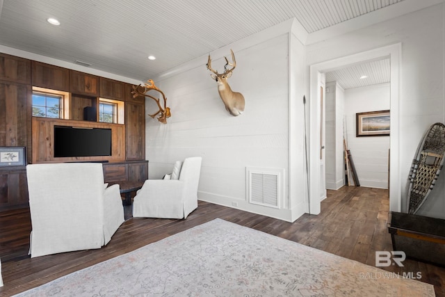 living room featuring dark hardwood / wood-style flooring