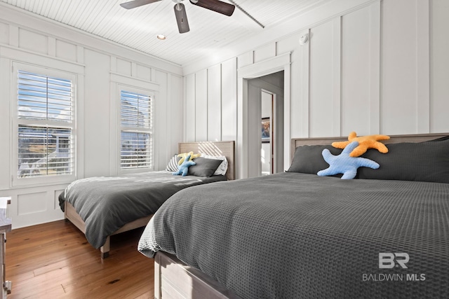 bedroom featuring ceiling fan and light hardwood / wood-style floors