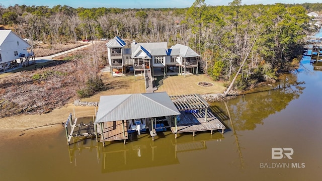 dock area with a water view