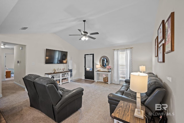 carpeted living area featuring lofted ceiling, a ceiling fan, baseboards, and visible vents