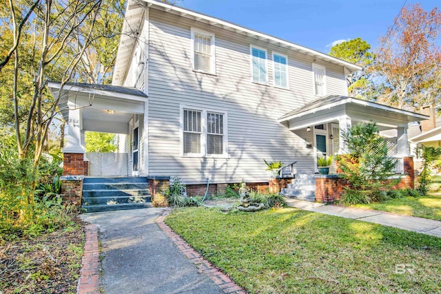 view of front of house featuring a porch and a front yard