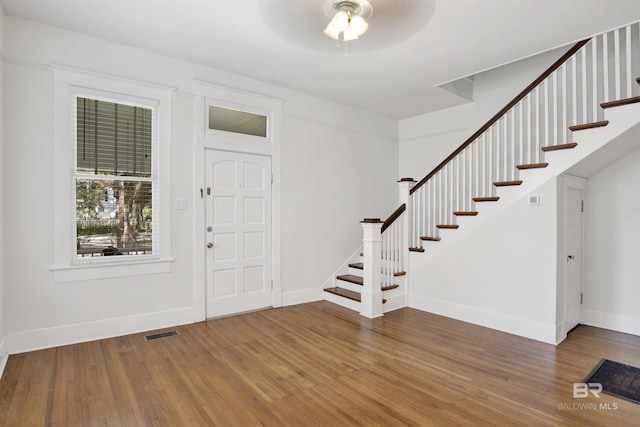 entrance foyer featuring hardwood / wood-style floors and ceiling fan