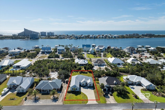 bird's eye view with a water view