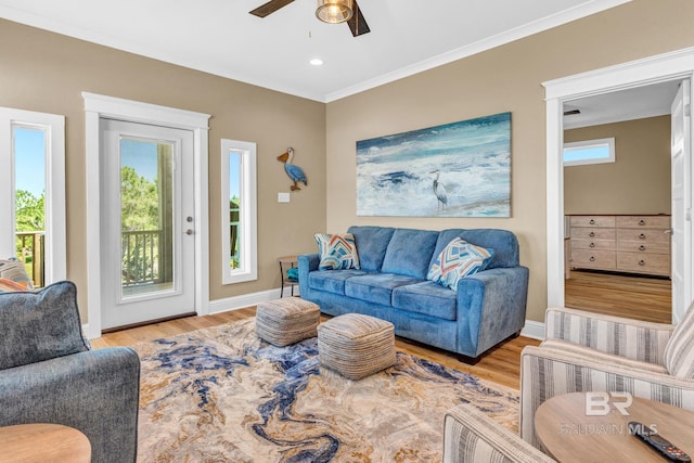 566 Boykin Ct N, Gulf Shores, AL 36542 - living room featuring wood finished floors, ceiling fan, ornamental molding, baseboards, and recessed lighting