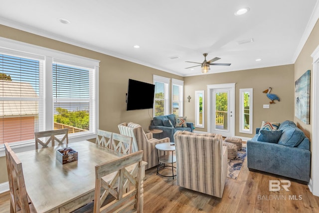 566 Boykin Ct N, Gulf Shores, AL 36542 - living area featuring crown molding, wood finished floors, ceiling fan, recessed lighting, and baseboards
