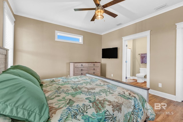 566 Boykin Ct N, Gulf Shores, AL 36542 - bedroom with wood finished floors, crown molding, baseboards, and ceiling fan