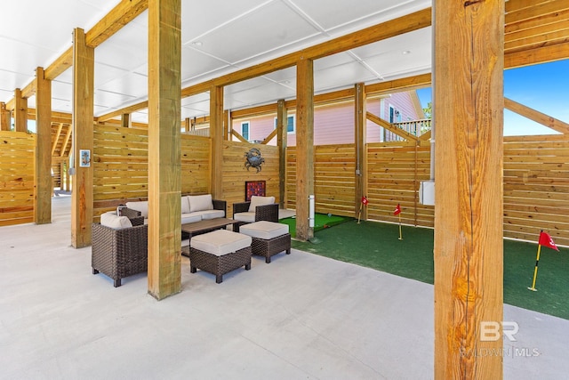 566 Boykin Ct N, Gulf Shores, AL 36542 - view of patio / terrace with an area to practice putting and an outdoor hangout area