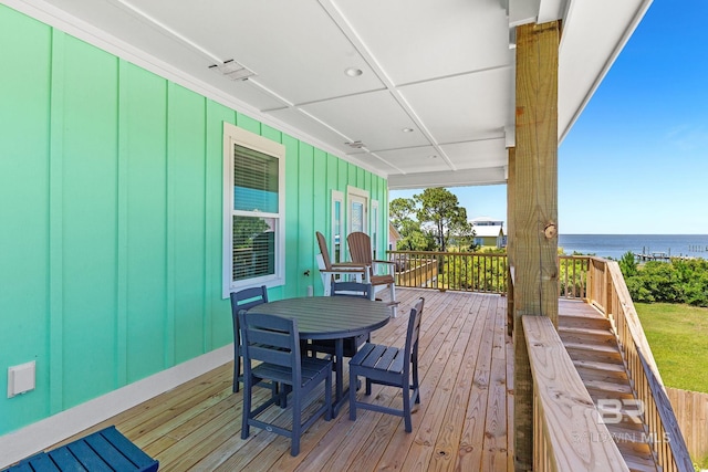566 Boykin Ct N, Gulf Shores, AL 36542 - deck featuring a water view and outdoor dining space