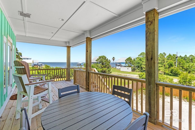566 Boykin Ct N, Gulf Shores, AL 36542 - wooden deck featuring a water view