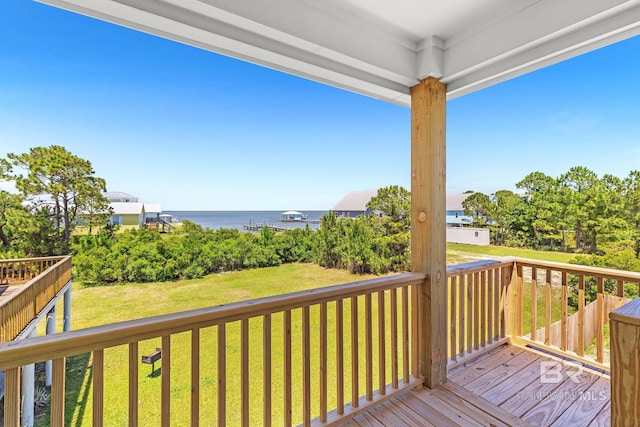 566 Boykin Ct N, Gulf Shores, AL 36542 - wooden deck with a yard and a water view