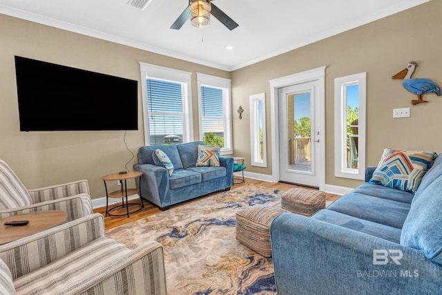 566 Boykin Ct N, Gulf Shores, AL 36542 - living room featuring baseboards, a ceiling fan, wood finished floors, crown molding, and recessed lighting