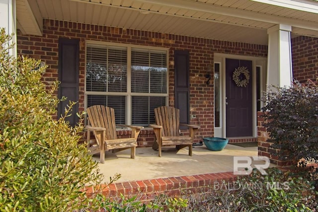 property entrance featuring covered porch