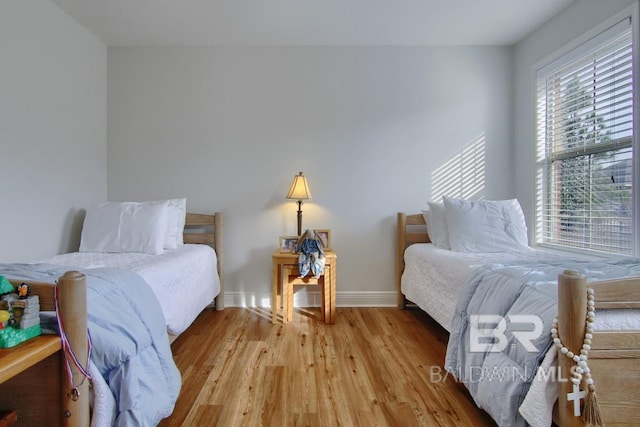 bedroom with light hardwood / wood-style floors