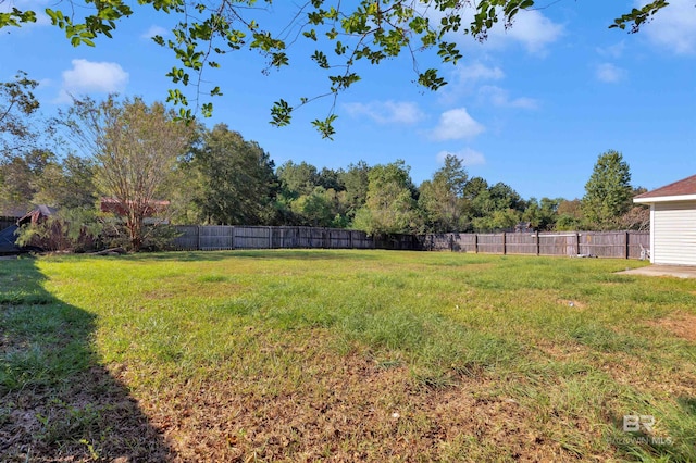 view of yard with fence