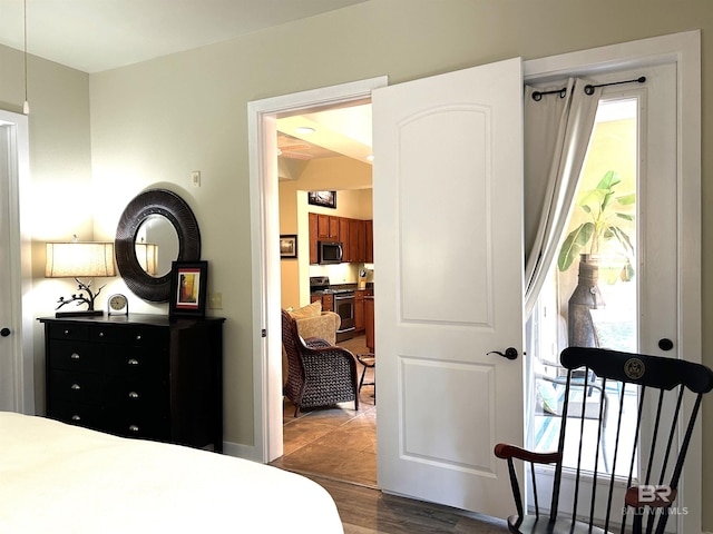 bedroom with wood finished floors