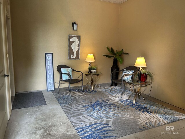 living room featuring french doors, ceiling fan, tile patterned floors, and beam ceiling