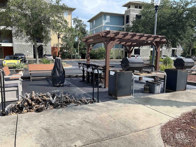 view of property's community featuring a pergola