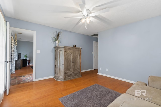 103 Hickory Ct, Daphne, AL 36526 - living room with light wood-style flooring, ceiling fan, and baseboards