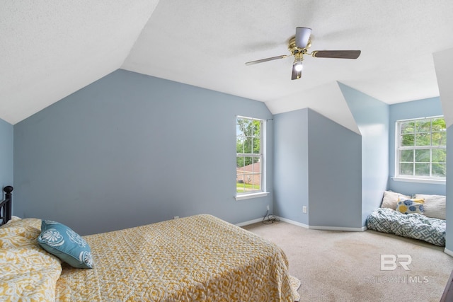 103 Hickory Ct, Daphne, AL 36526 - bedroom featuring vaulted ceiling, carpet flooring, multiple windows, baseboards, and ceiling fan
