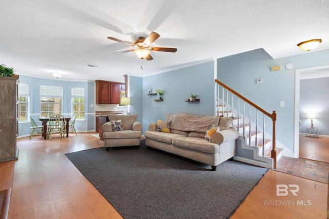 103 Hickory Ct, Daphne, AL 36526 - living area featuring ceiling fan, wood finished floors, stairs, baseboards, and ornamental molding