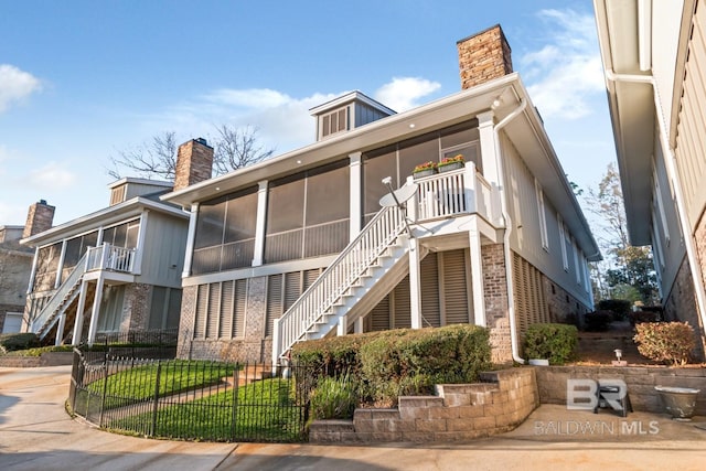 view of property featuring stairway