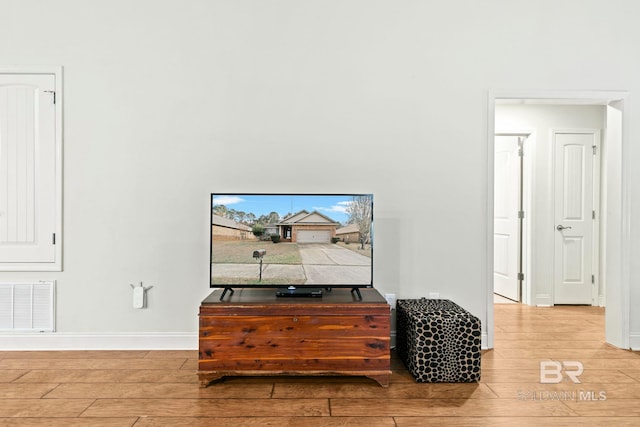 interior space with hardwood / wood-style flooring