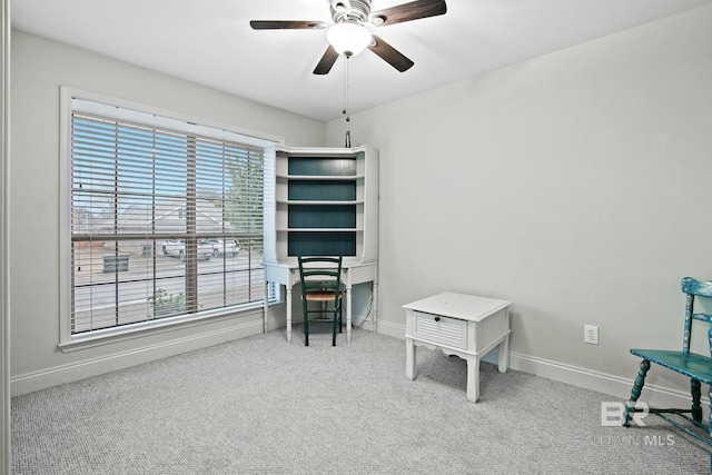 misc room with ceiling fan and carpet