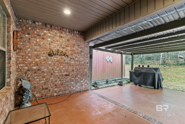 view of patio featuring a grill