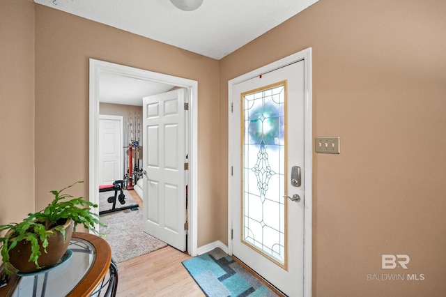 entryway with light wood-type flooring