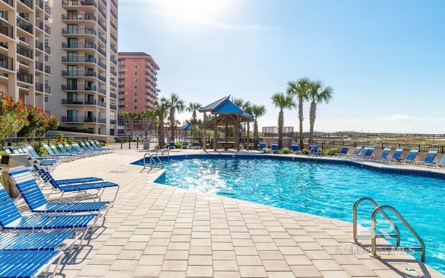 view of swimming pool featuring a gazebo