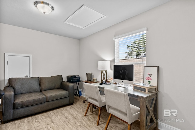 office featuring attic access, baseboards, and wood finished floors