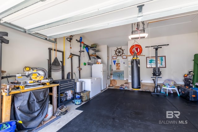 garage featuring a garage door opener, freestanding refrigerator, and water heater